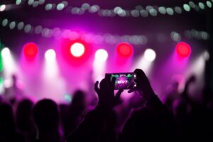 close-up-recording-video-with-smartphone-concert
